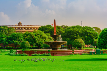 Wall Mural - Fountain near Sansad Bhawan or Parliament Building at house of the Parliament of India, New Delhi.  It was designed by the British architect Edwin Lutyens.