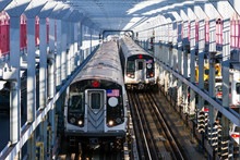 Subway Cars Crossing The Williamsburg Bridge From Brooklyn To Manhattan In New York City