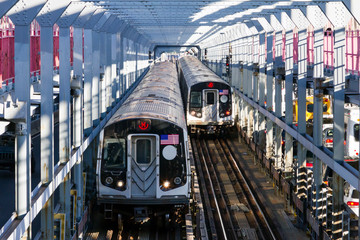 Subway cars crossing the Williamsburg Bridge from Brooklyn to Manhattan in New York City