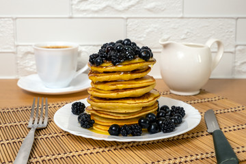 Sweet food. Pancakes with honey and berry fruit