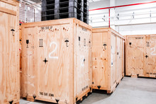 Wooden Boxes In The Warehouse. Boxes Out Of Wood For Packing Industrial Machinery. Warehousing. Packaging Of Finished Products Of The Plant. Sale Of Packaging Materials.