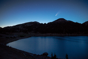 Wall Mural - The comet NEOWISE over the night horizon of Lassen Volcanic National Park in California.