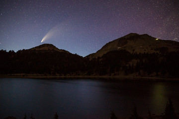 Wall Mural - The comet NEOWISE over the night horizon of Lassen Volcanic National Park in California.