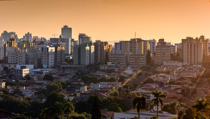 Panoramic downtown view: Houses and buildings during sunset