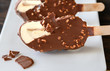 Chocolate-covered vanilla ice cream bar