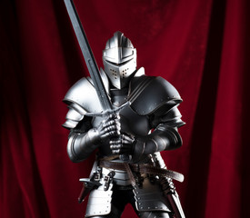 Wall Mural - knight with sword and red velvet background