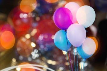 Canvas Print - Bunch of colorful balloons on bokeh background