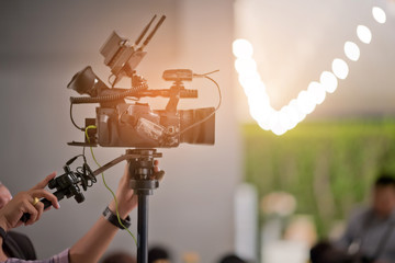 Wall Mural - videographer, man working with camera
