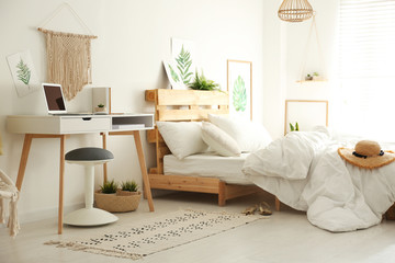 Poster - stylish room interior with workplace and bed