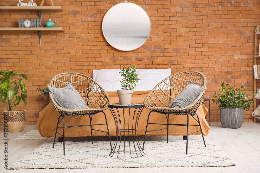 Interior of modern stylish room with armchairs