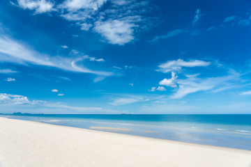 Wall Mural - Turquoise blue sea with white sand and sunny sky in summer with copy space