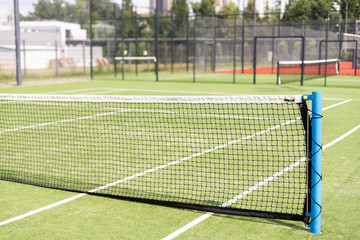 Tennis net and court. Playing Tennis. Healthy lifestyle