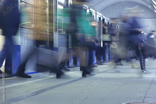 Fotomural crowd of people metro in motion blurred, abstract background urban traffic peopl