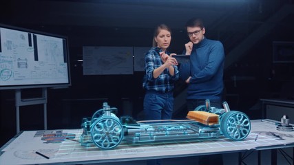 Poster - Automotive Engineer Wearing Virtual Reality Headset Working on 3D Electric Car Design, Using Gestures in Augmented Reality.  Designing Graphical Parts, Picks Body and Color for the Chassis, Engine
