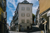 Fototapeta Uliczki - Wide angle view of narrow old streets of Alfama neighborhood in Lisbon, Portugal