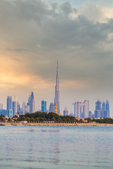 Wall Mural - Dubai skyline lakeview during cloudy sunset