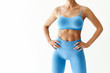 © GVS - Cropped image of fit woman torso  on white background with copy space