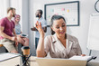 © LIGHTFIELD STUDIOS - Selective focus of businesswoman holding clipboard and pen while working near colleagues in white office