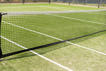 Wall Mural - Tennis net and court. Playing Tennis. Healthy lifestyle