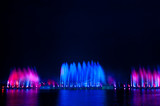Fototapeta Miasto - Amazing fantastic colorful fountain with blight at seaside.