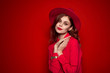 © SHOTPRIME STUDIO - woman in red shirt with bright makeup and hat on her head emotions fashion style