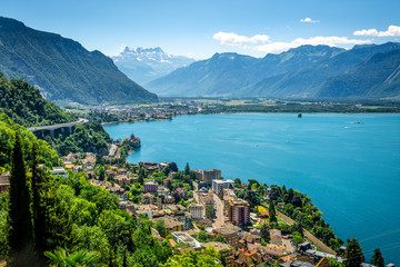 Aerial view of Geneva lake with Swiss Alps panorama from Montreux to Villeneuve and Chillon castle in Veytaux city Switzerland