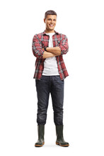 Full Length Portrait Of A Male Gardener In Boots Posing With Crossed Arms