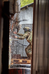 Wall Mural - Special Forces soldiers overcome obstacles