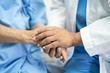 © amazing studio - Doctor holding touching hands Asian senior or elderly old lady woman patient with love, care, helping, encourage and empathy at nursing hospital ward, healthy strong medical concept