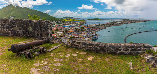 Wall Mural - A panorama view from Fort Louis above the settlement of Marigot in St Martin