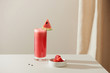 © Maki Company Limited/Stocksy - Cold watermelon smoothie drink in cocktail glass with slices of watermelon summer fruits