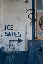 The Words ICE SALES Painted On Old Factory Wall