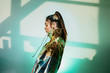 © Sergey Filimonov/Stocksy - Young woman in metallic jacket