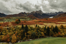 Landscape Photography About The Color Of The Mountain In Autumn, With Wonderful Rocky Mountains At Behind.