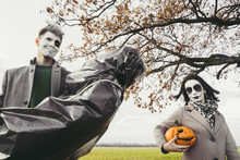 Halloween Couple And Corpse In Plastic Bag