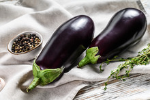 Raw Purple Eggplant. Organic Vegetables. White Background. Top View