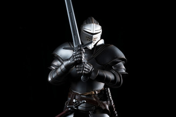 Wall Mural - knight with sword blue velvet background