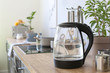 Modern electric kettle on kitchen counter