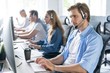 © opolja - Young handsome male customer support phone operator with headset working in call center.