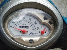 Mumbai, Maharashtra/India- August 16 2020: Analog Speedometer Of A Scooter During The Monsoon Season.