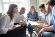 © opolja - Shot of a group of young business professionals having a meeting. Diverse group of young designers smiling during a meeting at the office.