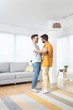 © focusandblur - Gay couple dancing at home
