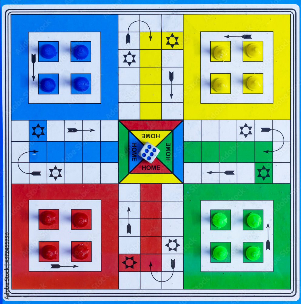 Triangle Ludo top view of a ludo game board with dice Stock Photo | Adobe Stock