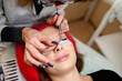 © fotofrol - Eyelash extensions in the beauty Studio.