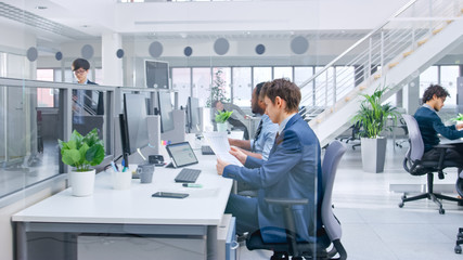 Poster - In Modern Office: Diverse Team of Managers and Specialists Work on Computer, Have Discussion with Colleagues and on the Phone. Young and Motivated Business people in Open Office.