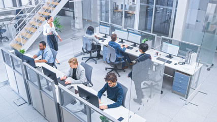 Poster - Diverse Multinational Team of Business Managers and Specialists Work on Desktop Computers, Have Discussion with Colleagues. Young and Motivated Business People in Modern Open Office. Shot from Above.