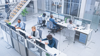 Poster - Diverse Multinational Team of Business Managers and Specialists Work on Desktop Computers, Have Discussion with Colleagues. Young and Motivated Business People in Modern Open Office. Shot from Above.