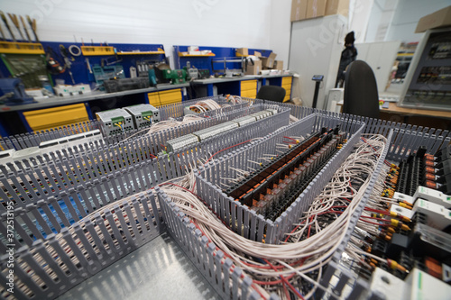 Fotomural Making an electricity panel board - a bunch of electric wires inside