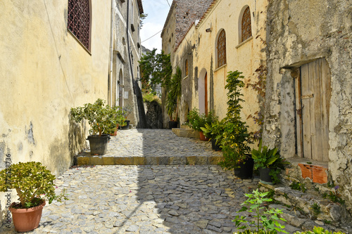A narrow street among the old houses of Scalea, a rural village in the Calabria region, Italy. © Giambattista