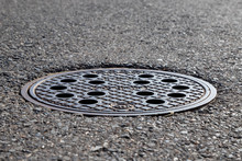 Closeup Of A Manhole Cover